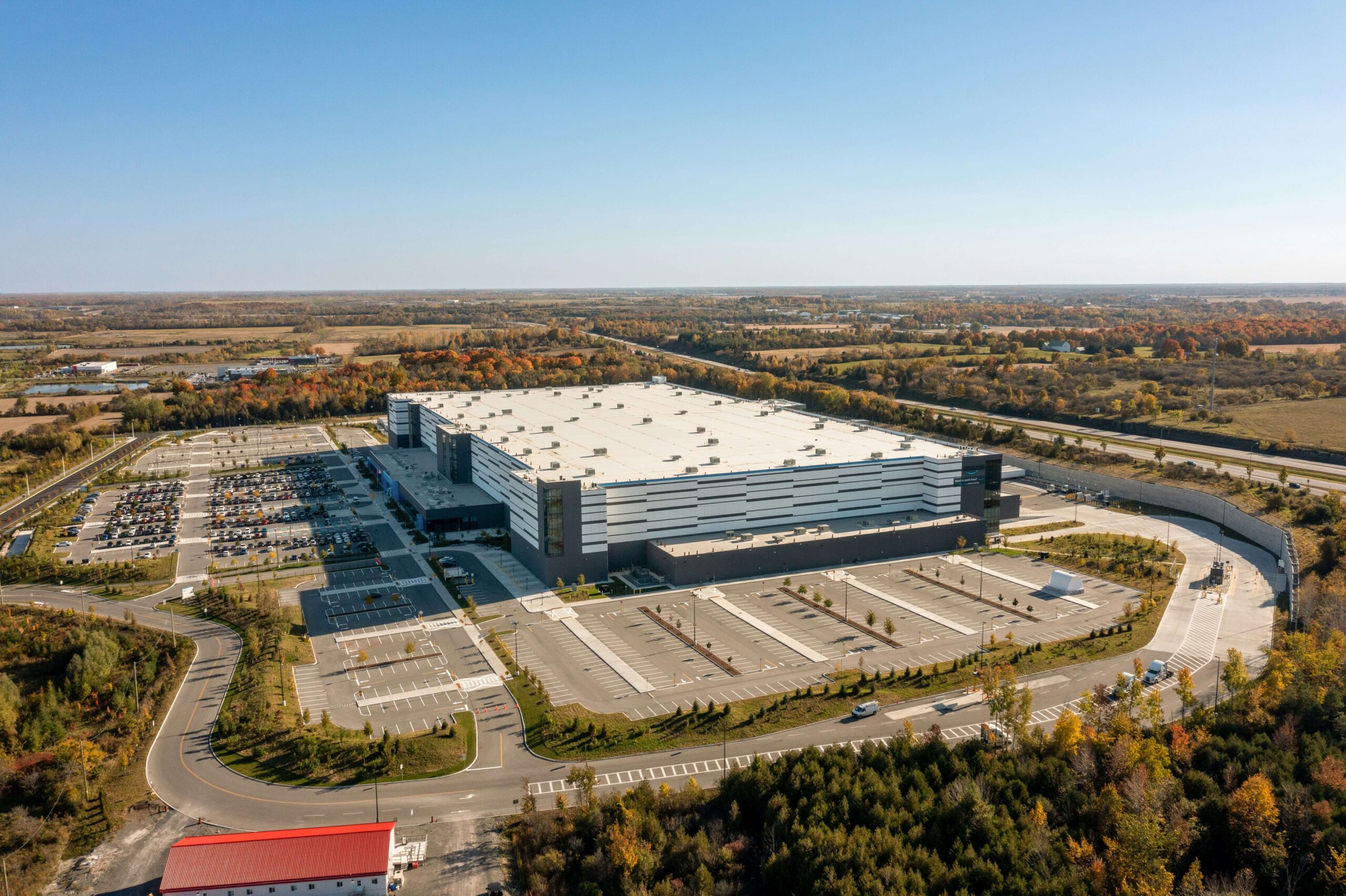 Aerial view of a new distribution center at dusk, captured for grand opening marketing