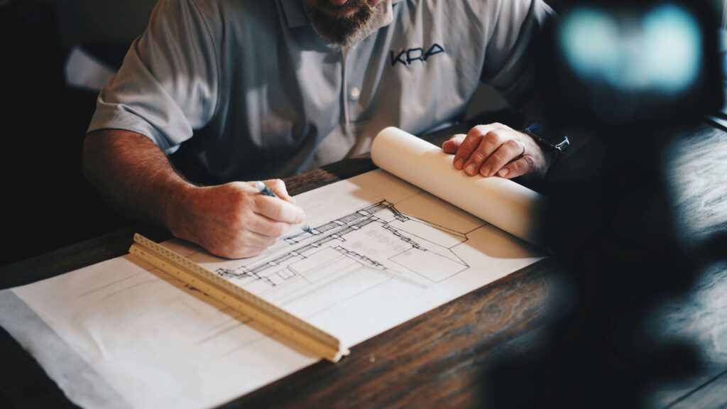 Reviewing construction blueprints — construction video strategy