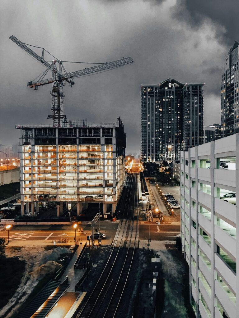 Tower crane over a construction site — construction video production