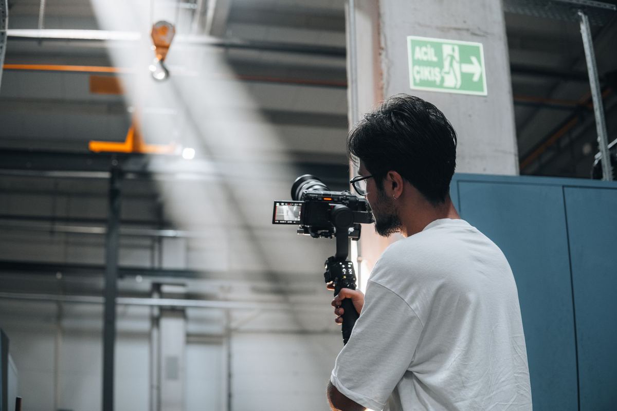 Company overview video being filmed on a production floor