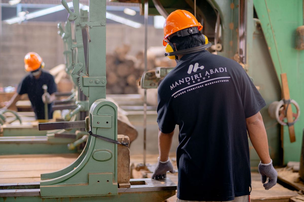 Machine operator at work photographed for a manufacturer website